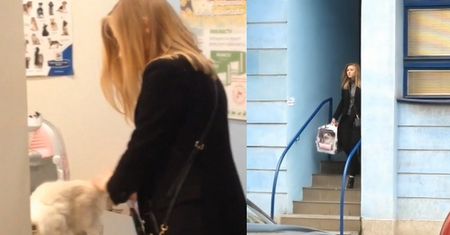 Kinga Duda z kotem u weterynarza