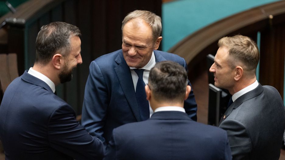Wladyslaw Kosiniak-Kamysz, Donald Tusk, and Slawomir Nitras are participating in the parliamentary debate on the appointment of Donald Tusk's government in Warsaw, Poland, on December 12, 2023. (Photo by Foto Olimpik/NurPhoto via Getty Images)