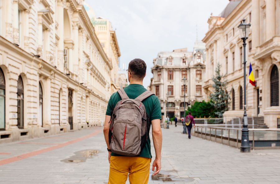 Man walking on the street in the old town of Bucharest