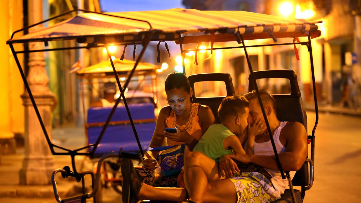 Views and People of Havana, Cuba
HAVANA, CUBA - DECEMBER 28: A Cuban cycle-taxi driver plays with his son as his wife uses her cellphone at a WiFi point on December 28, 2015 in ciudad vieja Habana, the old city of Havana, Cuba. In June 2015, the Cuban state installed 35 WiFi stations throughout the country which are accessed with the use of a pre-paid cards. (Photo by David Silverman/Getty Images)
David Silverman
wi-fi