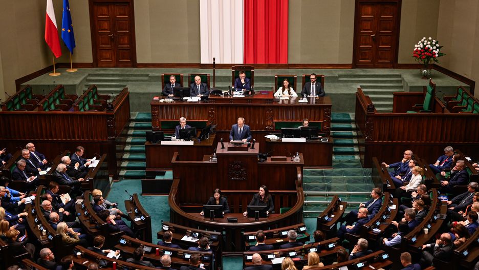 WARSAW, POLAND - DECEMBER 12: The leader of Civic Coalition (KO), Donald Tusk delivers a speech ahead of the vote of confidence on his government cabinet during a session at the parliament (SEJM) on December 12, 2023 in Warsaw, Poland. on December 12, 2023 in Warsaw, Poland. After eight years of Poland's national conservative party in power, centrist Donald Tusk is back and set to forge a pro-EU government. (Photo by Omar Marques/Getty Images)