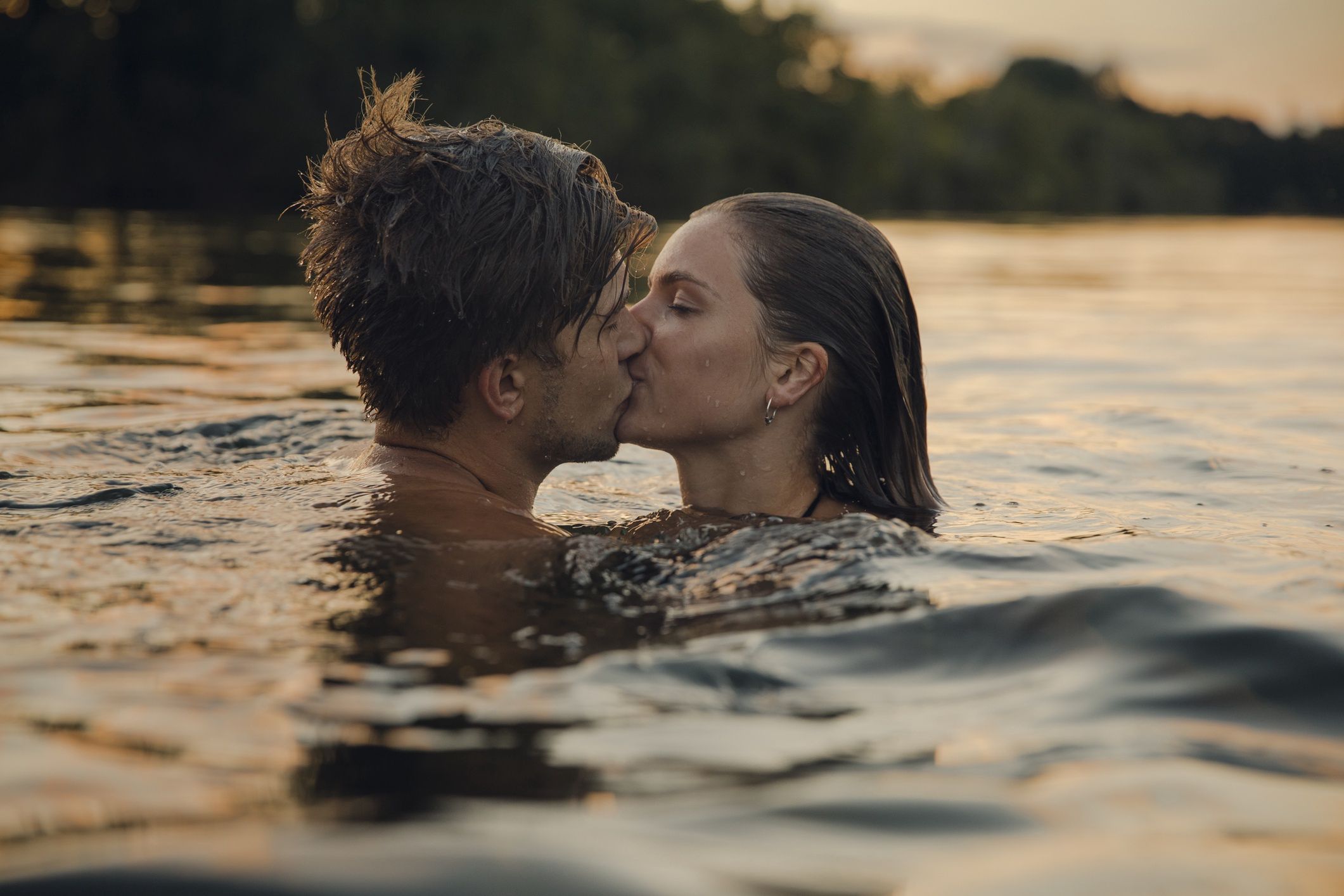 Young couple swimming in lake, kissing at sunset
Westend61
20-30 years, adult couple, adults, affection, backlit, caucasian, cloud, cooling, couple, emotion, emotional, evening, happy, in love, kiss, leisure, love, man, millennials, positive, recreation, relationship, tenderness, together, vacation, woman, young adults
