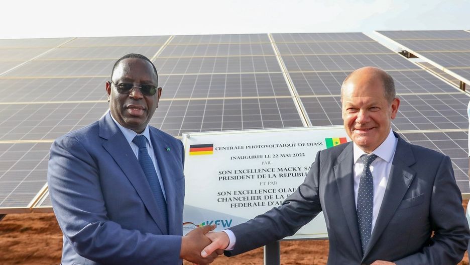 DIASS, SENEGAL - MAY 22: (----EDITORIAL USE ONLY â MANDATORY CREDIT - "PRESIDENCY OF SENEGAL / HANDOUT" - NO MARKETING NO ADVERTISING CAMPAIGNS - DISTRIBUTED AS A SERVICE TO CLIENTS----) President of Senegal Macky Sall and German Chancellor Olaf Scholz attend the inauguration of solar power plant in Diass, Senegal on May 22, 2022. (Photo by Presidency of Senegal/Anadolu Agency via Getty Images)