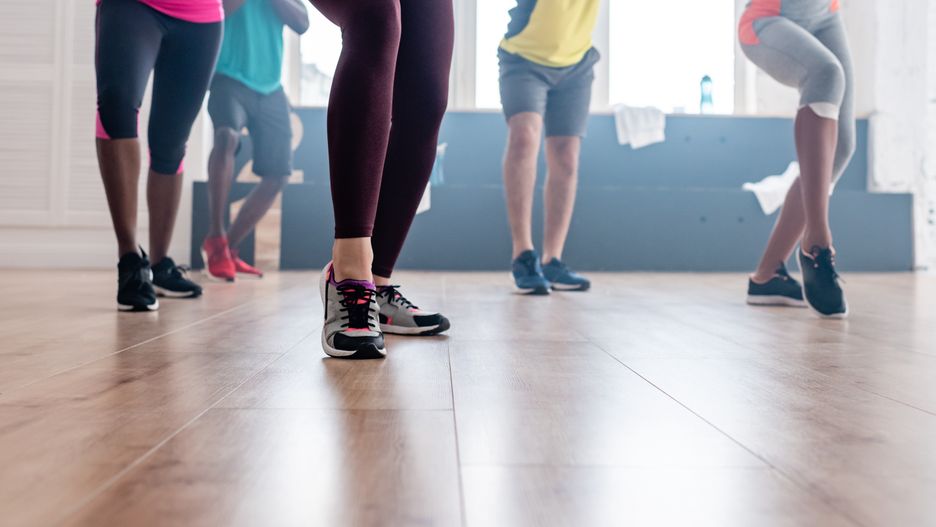 Cropped view of multicultural dancers exercising movements of zumba in dance studiosport,numbers,activity,group,women,sunlight,water,girls,drink,me, sport, numbers, activity, group, women, sunlight, water, girls, drink, men, beverage, legs, together, togetherness, fit, fitness, indoors, exercise, exercising, dance, footwear, dancing, training, daylight, sneakers, symbols, signs, backlit, choreography, partial, dancers, sportswear, cropped, multicultural, movements, multiethnic, copy space, selective focus, back light, young adult, african american, healthy lifestyle, black women, five people, black man, dance studio, zumba, sports bottles