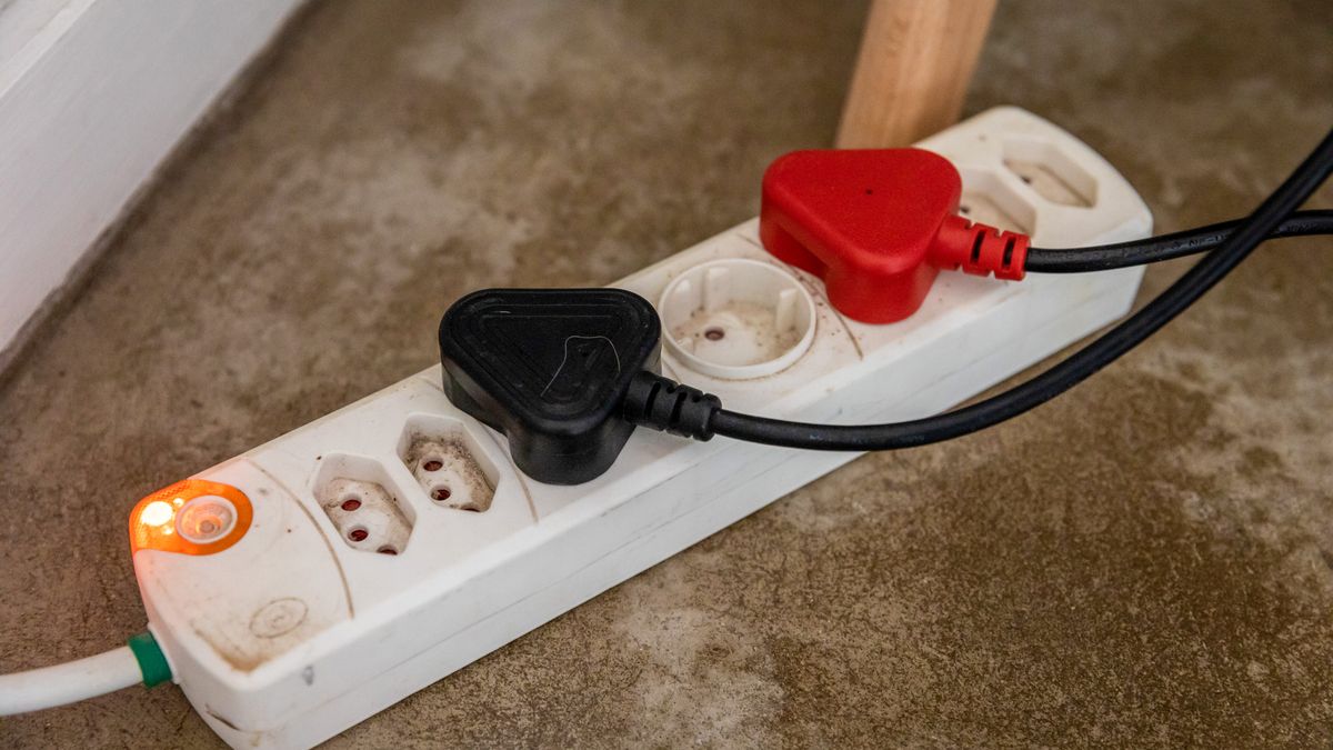 Domestic appliances plugged into an electrical extension port in a residential building in the Hout Bay district of Cape Town, South Africa, on Friday, April 22, 2022. South Africas state power utility Eskom Holdings SOC Ltd. warned the country may have more than 100 days of electricity blackouts this year because of outages at its power plants. Photographer: Dwayne Senior/Bloomberg via Getty Images