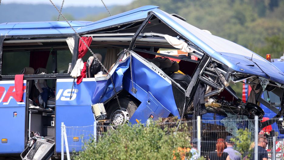Polish bus crash in Croatia
A crane works on removing the bus with Polish licence plates that slipped off a road, from the scene near Varazdin, northwestern Croatia, August 6, 2022. At least 12 people died and 31 injured after a Polish bus filled with religious pilgrims skidded off a highway in northern Croatia early on Saturday morning. 18 people among the 31 hurt have suffered serious injuries after the bus crashed off the A4 highway in Podvorec, about 30 miles (50km) north of capital Zagreb. Photo: Matija Habljak/PIXSELL 
Dostawca: PAP/PIXSELL
Matija Habljak/PIXSELL
accident, bus, emergency, police
