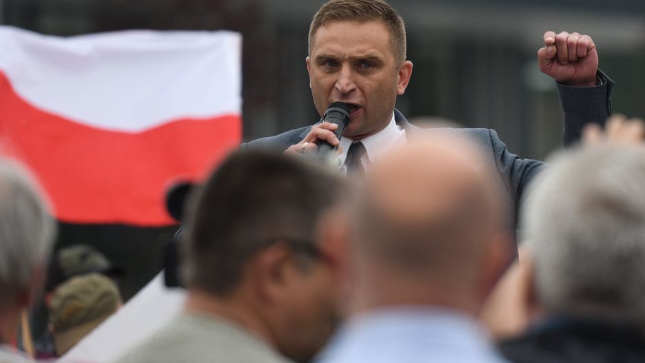 Robert Bakiewicz addresses members of right wing organisations during a march to  commemorate the 80th anniversary of the first transport of 728 Polish prisoners to Auschwitz German Death Camp.In 2006, the Polish Sejm (parliament) voted to make June 14th the National Day of Remembrance for the Victims of German Nazi Concentration and Extermination Camps. Today, the Auschwitz Museum was closed because of Polish President Andrzej Duda's visit. Only a few visitors who had applied in advance were allowed in.On June 14, 2020, in Oswiecim, Poland. (Photo by Artur Widak/NurPhoto via Getty Images)