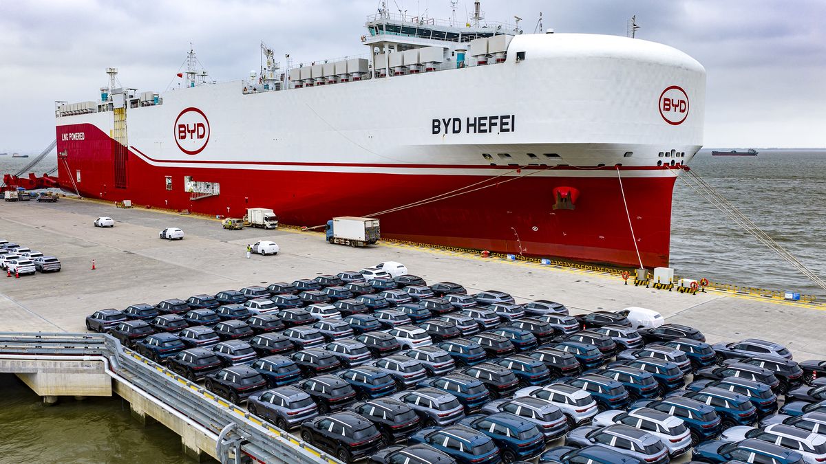 TAICANG, CHINA - AUGUST 12: New energy vehicles are loaded onto the BYD 'Hefei' car carrier at Taicang Port on August 12, 2026 in Suzhou, Jiangsu Province of China. China's automobile exports have exceeded one million units for two consecutive months. (Photo by Ji Haixin/VCG via Getty Images)