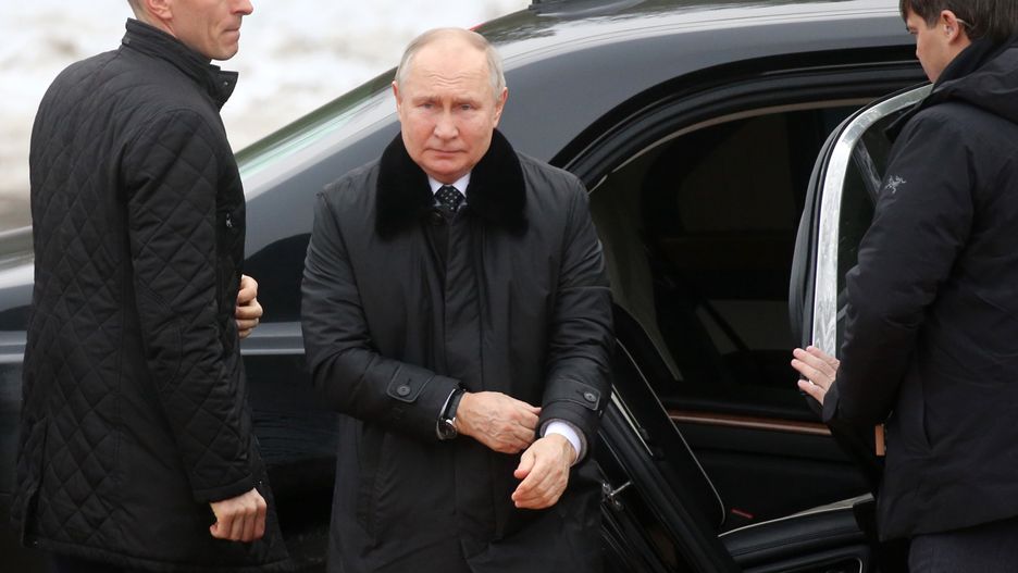 KIROVSK, RUSSIA - JANUARY 27: (RUSSIA OUT) Russian President Vladimir Putin leaves the car prior to placing flowers on the memorial of the battlefield of Nevsky Patachok, commemorating the victims of the Siege of Leningrad on January 27, 2024, in Kirovsk, outside of Saint Petersburg, Russia. President Putin is having a four-day trip to Saint Petersburg prior to the 2024 Presidential Elections. (Photo by Contributor/Getty Images)