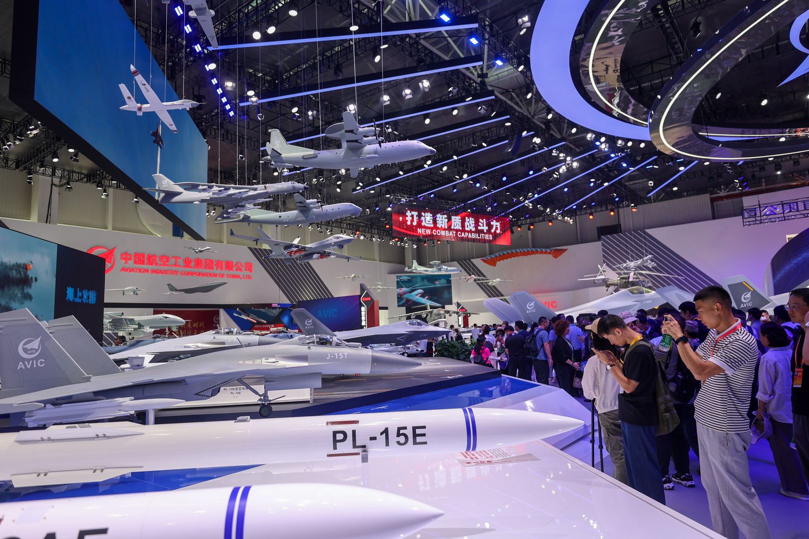 ZHUHAI, CHINA - NOVEMBER 13: Scale models of the J-15T fighter jet and the PL-15 missile are on display at the exhibition hall of the state-owned Aviation Industry Corporation of China (AVIC) on day 2 of the 15th China International Aviation and Aerospace Exhibition, or Airshow China 2024, at the China International Aviation & Aerospace Exhibition Center on November 13, 2024 in Zhuhai, Guangdong Province of China. (Photo by Zou Wei/VCG via Getty Images)