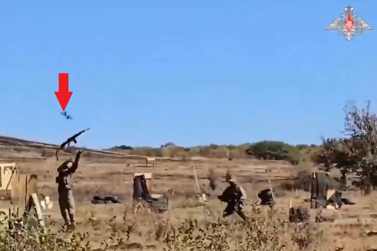 Throwing a Kalashnikov as anti-drone defense during training.