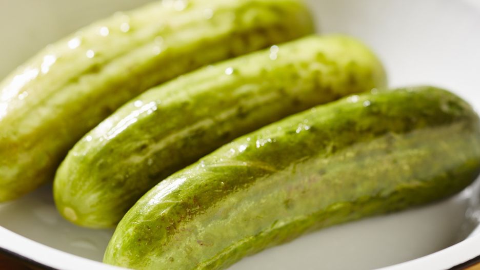 Three semi-pickled cucumbers (a traditional delicacy from New York City)