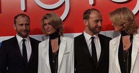 Spięty Szyc pozuje z narzeczoną na premierze komedii romantycznej