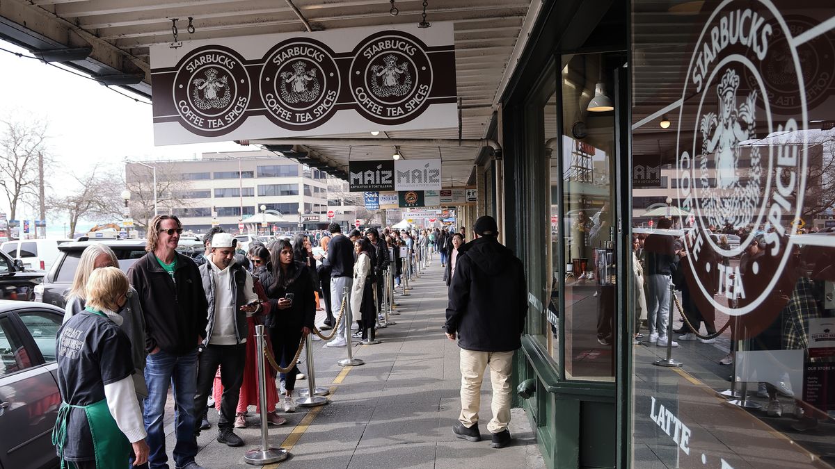 SEATTLE, WASHINGTON - MARCH 19: Customers wait to enter a Starbucks store on March 19, 2023 in Seattle, Washington. (Photo by I RYU/VCG via Getty Images)