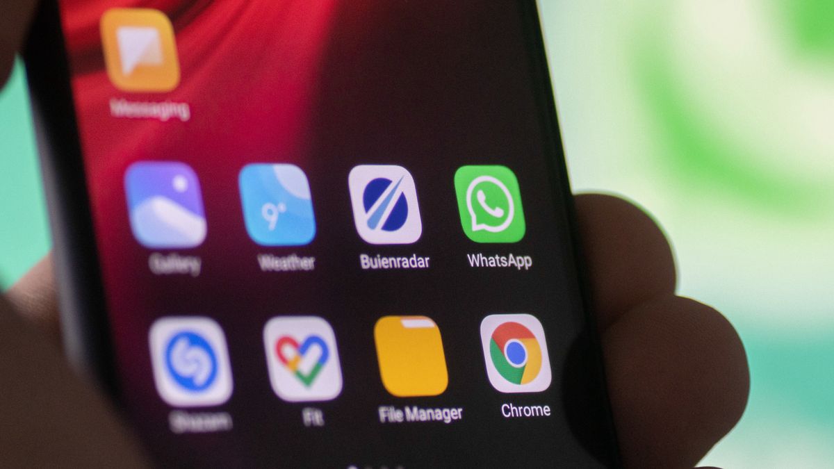 WhatsApp logo displayed on a phone screen, smartphone and keyboard are seen in this multiple exposure illustration. WhatsApp Messenger is a multiplatform mobile application that provides an encrypted instant messaging system belonging to Facebook, photo taken in Amsterdam, Netherlands on January 28, 2020 (Photo illustration by Nicolas Economou/NurPhoto via Getty Images)