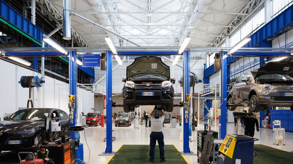 Employees works on the production floor of the SUSTAINera Circular Economy Hub at Stellantis NV's Mirafiori complex in Turin, Italy, on Thursday, Nov. 23, 2023. Stellantis will invest in hybrid-electric transmission production and recycling activities at its iconic Turin factory thats being retooled into a battery-vehicle hub to help safeguard jobs. Photographer: Giuliano Berti/Bloomberg via Getty Images