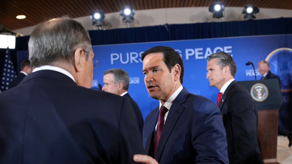 ANCHORAGE, ALASKA - AUGUST 15: U.S. Secretary of State Marco Rubio talks to Russian Minister of Foreign Affairs Sergey Lavrov at the end of a press conference between U.S. President Donald Trump and Russian President Vladimir Putin at Joint Base Elmendorf-Richardson on August 15, 2025 in Anchorage, Alaska. The two leaders are meeting for peace talks aimed at ending the war in Ukraine.  (Photo by Andrew Harnik/Getty Images)