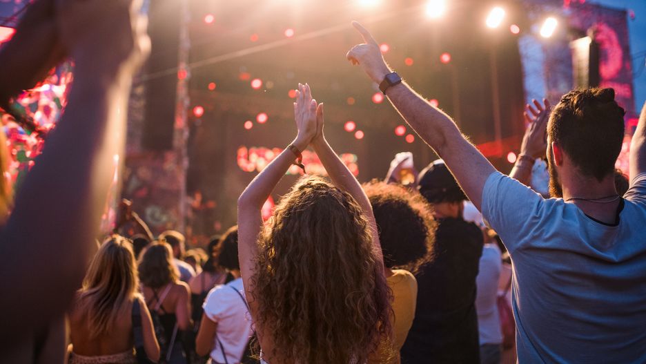 Rear view of group of young friends dancing at summer festival.Rear view of group of unrecognizable young friends dancing at summer festival.group, people, man, woman, boy, girl, males, females, boyfriend, girlfriend, adults, young, youth, event, together, celebration, joy, cool, happy, cheerful, excitement, enjoying, culture, performance, caucasian, friends, friendship, generation y, generation z, millenials, outdoors, outside, summer, festival, concert, uprising, music, funky, casual, clothes, trendy, standing, view, waist up, dancing, stage, audience, rear, group, people, man, woman, boy, girl, males, females, boyfriend, girlfriend, adults, young, youth, event, together, celebration, joy, cool, happy, cheerful, excitement, enjoying, culture, performance, caucasian, friends, friendship, generation y, generation z, millenials, outdoors, outside, summer, festival, concert, uprising, music, funky, casual, clothes, trendy, standing, view, waist up, dancing, stage, audience, rear