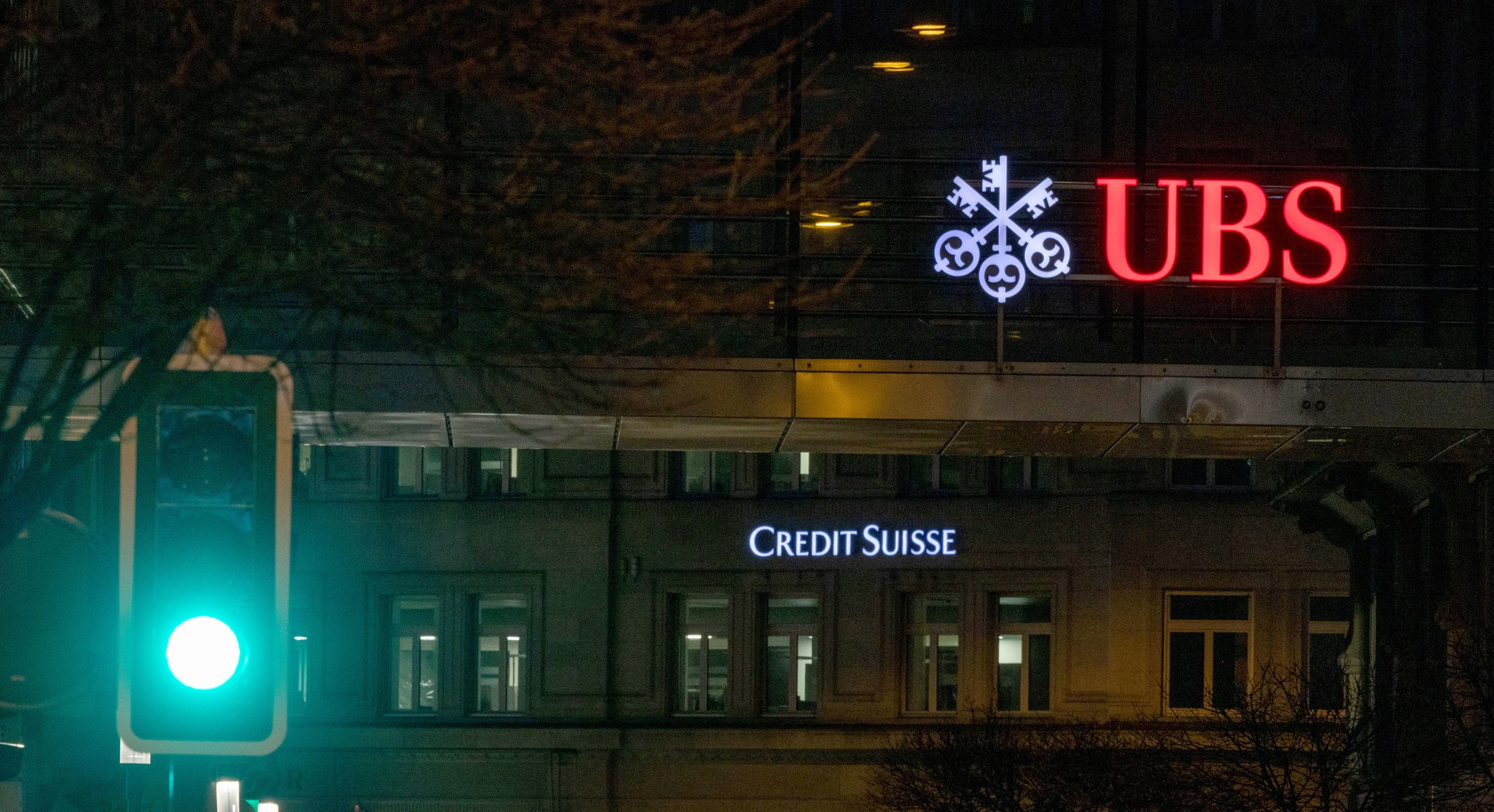 Credit Suisse Shares Tumble, Send Shockwaves Through European BankingZURICH, SWITZERLAND - MARCH 16: A traffic sign is seen in front of the logos of Swiss banks Credit Suisse and UBS the day after its shares dropped approximately 30% on March 16, 2023 in Zurich, Switzerland. Credit Suisse has reportedly asked the Swiss government for support following the refusal of a Saudi backer to provide any more money. The sharp drop in share price sent shares of other major European banks down. The disruption is coming on the heels of the failure of Silicon Valley Bank in the USA. (Photo by Arnd Wiegmann/Getty Images)Arnd Wiegmann
