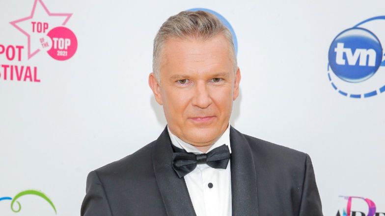 Grzegorz Kajdanowicz pozuje w Sopocie z partnerką