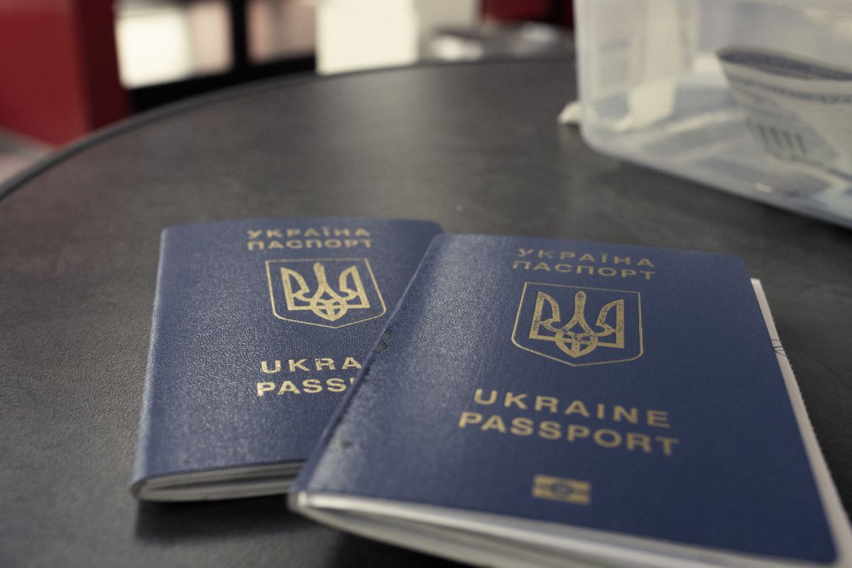 Ukrainian passports at Tijuana International Airport in Tijuana, Mexico, on Friday, April 22, 2022. A new program was set to take effect Monday to streamline applications for Ukrainians into the United States in order to minimize the number of refugees seeking asylum through U.S. borders with Mexico, reports NBC. Photographer: Nicolo Filippo Rosso/Bloomberg via Getty Images