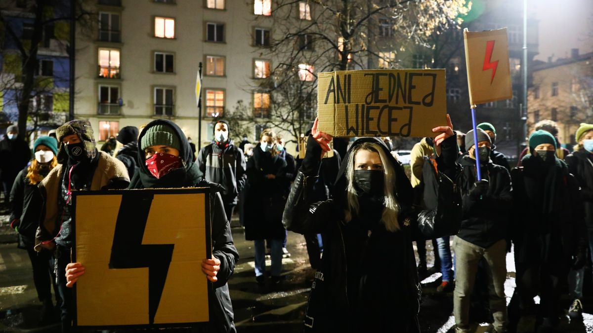 Protest Against The Abortion Ban In Poland After Death Of Pregnant WomanPeople protest in front of the Law and Justice (PiS) ruling party office, attending demonstration against the abortion ban. Krakow, Poland on January 26, 2022. Agnieszka, a 37-year-old woman pregnant with twins, died on January 25th after she was admitted to the hospital in Czestochowa, where the first of her sons died on December 23. The pregnancy was terminated only on December 31, despite the death of the second foetus had been pronounced earlier.  (Photo by Beata Zawrzel/NurPhoto via Getty Images)NurPhotopolish, cracow, european, rally, demonstration, manifestation, ban, unrest, woman, rights, human, strike, mouring, not, one, more, pregnancy, medical, group, crowd, banner, pis) ruling party office, abortion ban, 37-year-old woman, second foetus, front, justice, agnieszka, twins