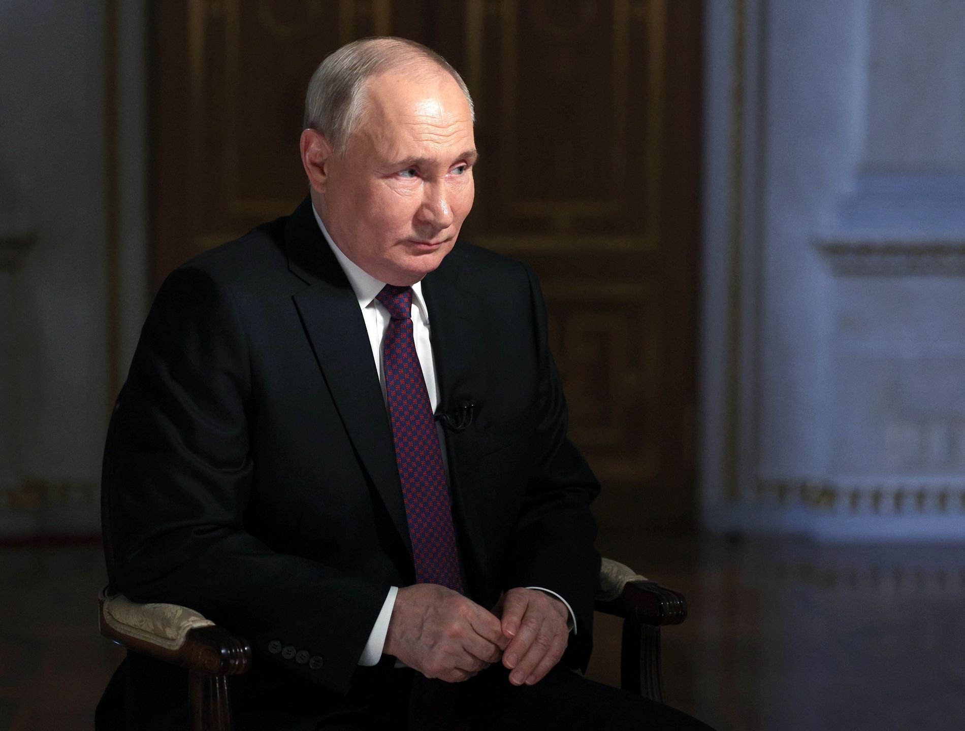 Russian President Vladimir Putin attends an interview with Rossiya Segodnya International Media Group Director General Dmitry Kiselev at the Kremlin in Moscow, Russia, 13 March 2024. Putin gave an interview to Russia's state media ahead of the upcoming presidential election. EPA/GAVRIIL GRIGOROV/SPUTNIK/KREMLIN POOL MANDATORY CREDIT Dostawca: PAP/EPA.
