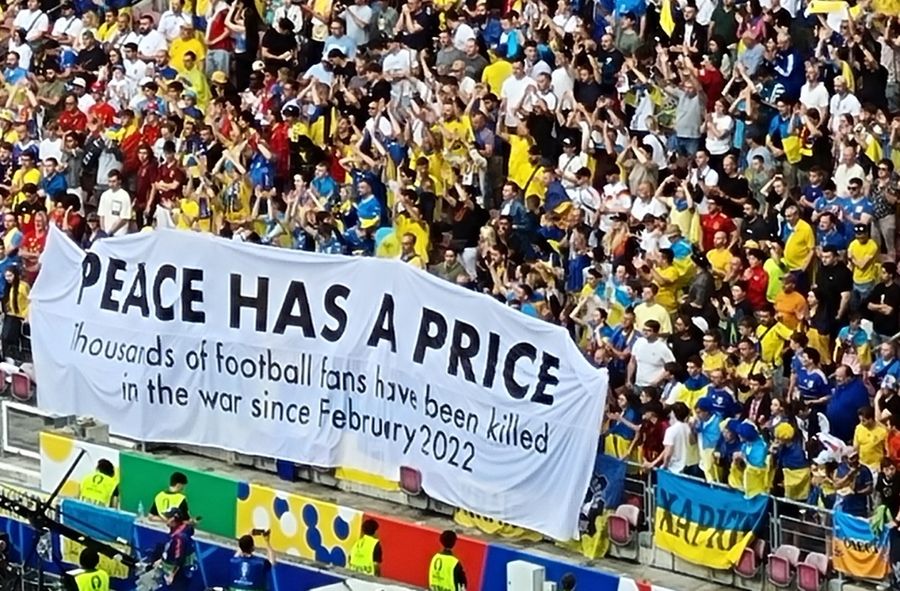 Ukrainian football fans display anti-war banner during Euro 2024 match