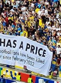 Ukrainian football fans display anti-war banner during Euro 2024 match