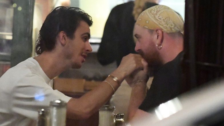 Sam Smith and Christian Cowan exchange affections