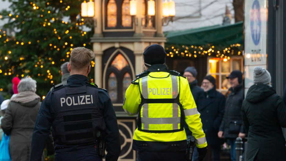 Police are patrolling the Cologne Christmas market at the old city center in Cologne, Germany, on November 30, 2023, after two teens were arrested on suspicion of plotting an attack. (Photo by Ying Tang/NurPhoto via Getty Images)
