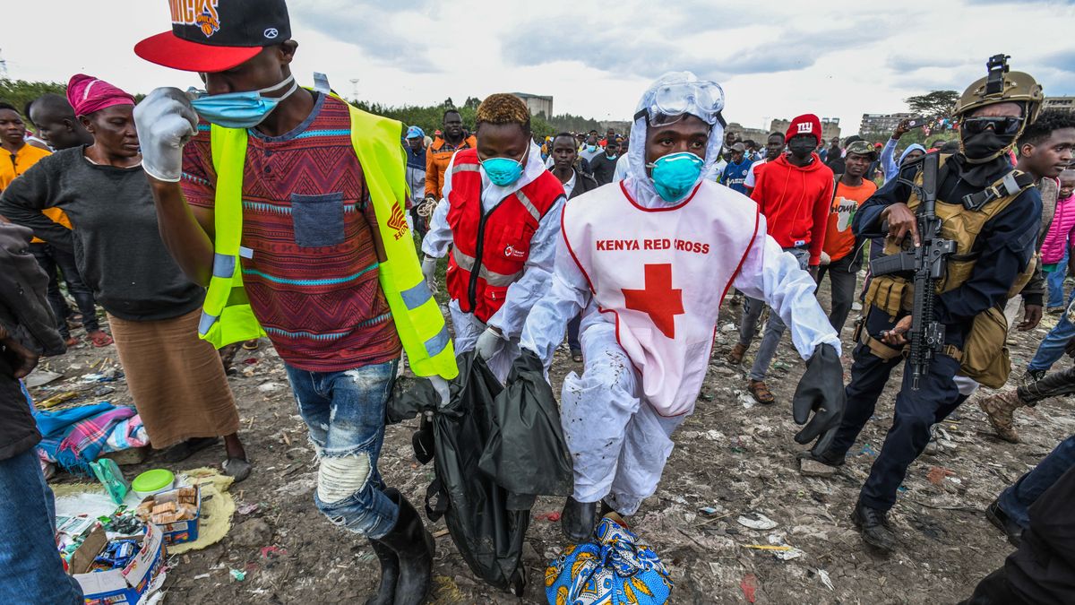 NAIROBI, KENYA - JULY 13: 10 lifeless bodies were retrieved from a landfill in the Mukuru kwa Njenga area in Nairobi, Kenya on July 13, 2024. Kenyan police have launched an investigation into the incident, expressing concern that the number of bodies could rise. Armed personnel have been deployed to the area, and the bodies have been placed in body bags by personnel to be transported to the morgue from the site. (Photo by Gerald Anderson/Anadolu via Getty Images)