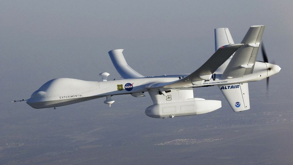 SPL RM HD
Altair unmanned aerial vehicle (UAV) in flight over the Esperanza Fire, a wildfire that occurred in October 2006 near Palm Springs, California, USA. Using an infrared imaging sensor in its underbelly pod, the Altair UAV flew repeatedly over the Esperanza Fire to aid firefighting efforts. The Altair is a 26-metre wingspan unarmed variant designed for NASA of the General Atomics MQ-9 Reaper (Predator B) UAV. The Altair first flew in June 2003 and can fly for 32 hours. It is being used by NASA to develop a range of applications under its Environmental Research Aircraft and Sensor Technology (ERAST) project. Photographed on 25 October 2006.
NASA/General Atomics Aeronautical Systems