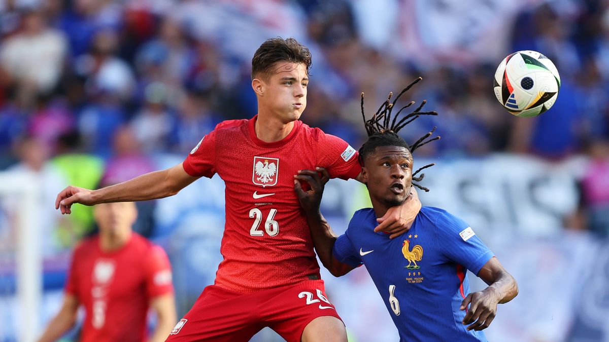 DORTMUND, GERMANY - JUNE 25: Eduardo Camavinga of France battles for possession with Kacper Urbanski of Poland during the UEFA EURO 2024 group stage match between France and Poland at Football Stadium Dortmund on June 25, 2024 in Dortmund, Germany. (Photo by Matt McNulty - UEFA/UEFA via Getty Images)