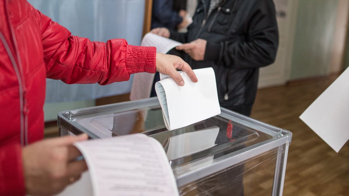 Illustrative image of the election in a democratic society. Elections in Ukraine. The process of voting at a polling station. The voter throws the ballots in the ballot box.Illustrative image of the election in a democratic society. Elections in Ukraine. The process of voting at a polling station. The voter throws the ballots in the ballot box.sodel vlad +380504460796ballot, ballot box, day, democracy, democratic, elderly, election, elections, hand, image, old, politic, politics, polling, poor, process, society, station, vote, voted, voter, voting booth, ballot, ballot box, day, democracy, democratic, elderly, election, elections, hand, image, old, politic, politics, polling, poor, process, society, station, vote, voted, voter, voting booth