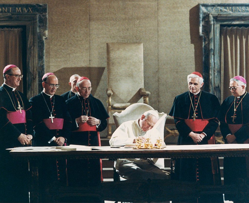 Pope John Paul II Signs Law(Original Caption) Pope John Paul II signs the new Roman Catholic Code of Canon Law. (L to R): Msgr. Bruno Fagiolo of the Vatican Secretariat; Msgr. Martinez Somal, Vatican undersecretary of State; Cardinal Agostino Casaroli, Vatican Secretary of State; Pope; West German Cardinal Joseph Ratzinger and Venezuelan Archbishop Rosalio Jose Castillo Lara, Chairman of the Vatican commission that has been revising the code for the last two decades.BettmannRoman Catholic Church:CB2, roman catholicism:CB2, Eastern European descent:CB2, German:CB2, group of people:CB1, Italian:CB2, religion:CB2, Southern European descent:CB2, half-length:CB2, portrait:CB2, Western European descent:CB2, prominent persons:CB2, secretary of state:CB2, diplomat:CB2, Venezuelan:CB2, pope:CB3, cardinal:CB2, legal document:CB2, Latin American and Hispanic ethnicity:CB2, elderly man:CB2, archbishop:CB2, signing:CB2, monsignor:CB2, Polish:CB2, Consistorial Hall:CB1, Vatican City:CB2, Agostino Casaroli:CB2, Pope Benedict XVI:CB2, Rosalio Jose Castillo Lara:CB2, Vincenzo Fagiolo:CB2, Pope John Paul II:CB3