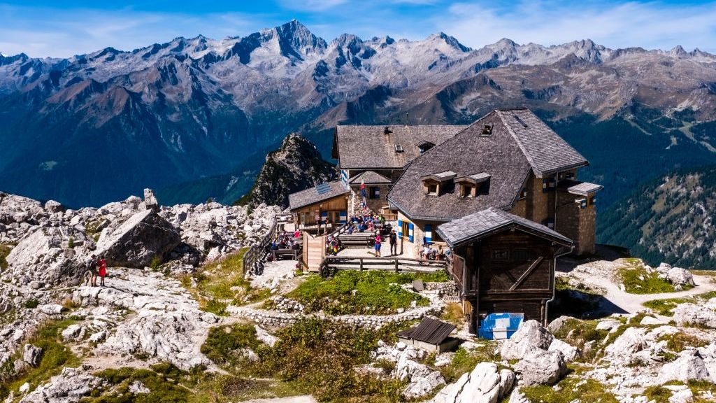 The mountain hut Rifugio Francis Fox Tuckett on via ferrata
MADONNA DI CAMPIGLIO, TRENTINO-ALTO ADIGE, ITALY - 2022/09/13: The mountain hut Rifugio Francis Fox Tuckett on via ferrata Via delle Bocchette, the Adamello mountain group in the distance. (Photo by Frank Bienewald/LightRocket via Getty Images)
Frank Bienewald
adamello, adamello brenta natural park, aerial, alto adige, brenta dolomites, brenta group, building, buildings, cloud, clouds, cloudy, dolomiti di brenta, mountains, outdoor, outside, parco naturale adamello brenta, person, rifugio francis fox tuckett, sankt maria im pein, summit, tourists, world heritage, alpine, alpine hut, brenta, countryside, dolomite alps, dolomiti, italia, italian, landscape, national, park, range, rock, south tyrol, summits
