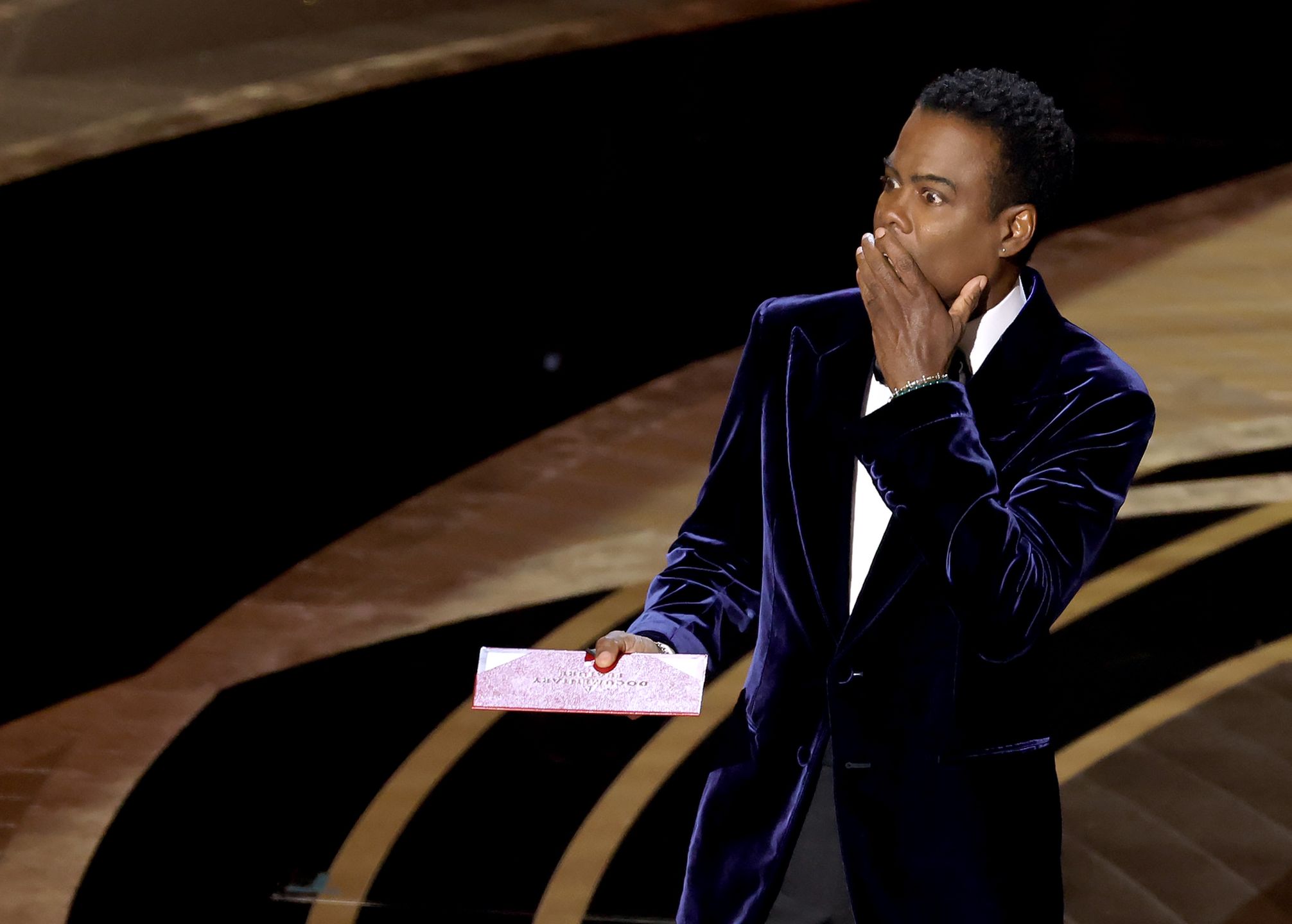 94th Annual Academy Awards - ShowHOLLYWOOD, CALIFORNIA - MARCH 27: Chris Rock speaks onstage during the 94th Annual Academy Awards at Dolby Theatre on March 27, 2022 in Hollywood, California. (Photo by Neilson Barnard/Getty Images)Neilson Barnardoscars, bestof, topix