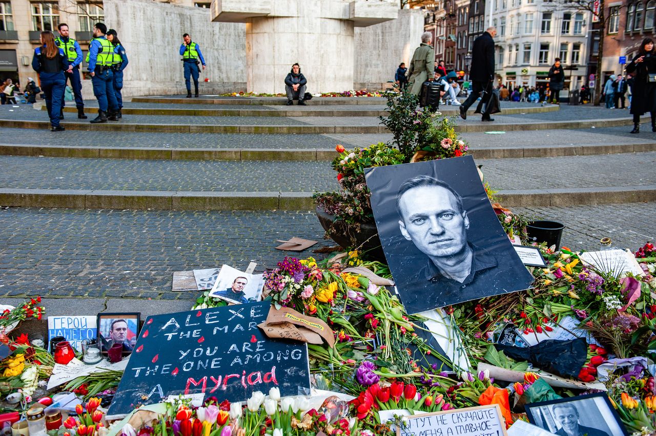 AMSTERDAM, NETHERLANDS - 2024/03/08: A big photo of Alexei Navalny is seen placed in the middle of the flowers. Three weeks after the death of Russian opposition leader, lawyer, anti-corruption activist, and political prisoner Alexei Navalny, the memorial that was placed at the center of the city of Amsterdam, full of flowers and messages in support of him. Alexei Navalny's death in prison was announced on 16 February by the prison authorities at the Siberian penal colony where he was being held. Alexei Navalny's widow Yulia has vowed to continue his work to fight for a "free Russia" in a video posted a few weeks ago. (Photo by Ana Fernandez/SOPA Images/LightRocket via Getty Images)