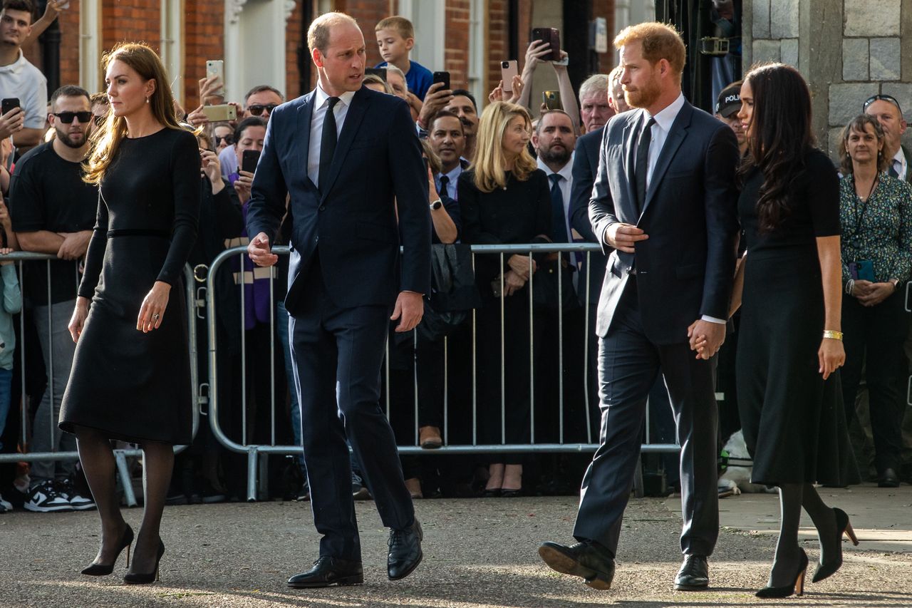 Prince William and Catherine, the new Prince and Princess of Wales, accompanied by Prince Harry and Meghan, the Duke and Duchess of Sussex, proceed to greet well-wishers outside Windsor Castle on 10th September 2022 in Windsor, United Kingdom. Queen Elizabeth II, the UK's longest-serving monarch, died at Balmoral aged 96 on 8th September 2022 after a reign lasting 70 years. (photo by Mark Kerrison/In Pictures via Getty Images)