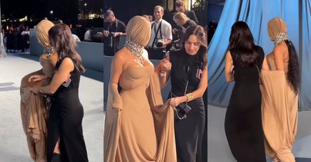 Asystentka pomagała Kim Kardashian WEJŚĆ na galę. Przez rajstopę (?) na głowie celebrytka nic nie widziała... (WIDEO)