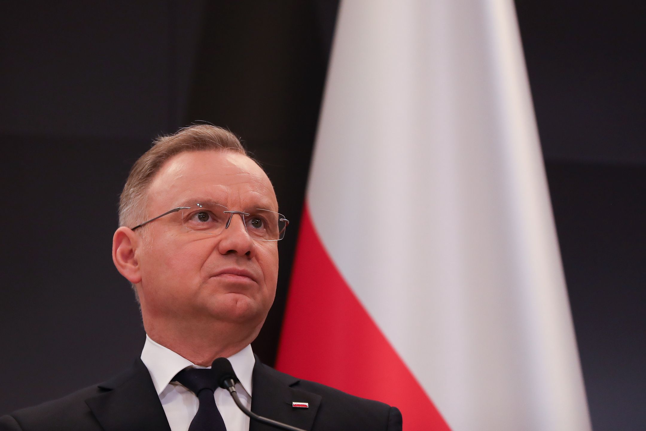 In Oswiecim, Poland, on April 24, 2025, Andrzej Duda, President of Poland, makes a media statement with Isaac Herzog, President of Israel, during the March of the Living at Auschwitz. The March of the Living has been organized in Oswiecim since 1988. On the 37th anniversary of the first event, people from all over the world participate. Participants march through the so-called Road of Death, the route between the former Auschwitz I and Auschwitz II-Birkenau camps. The march is led by 80 Holocaust survivors and survivors of the Hamas attack on October 7. (Photo by Klaudia Radecka/NurPhoto via Getty Images)