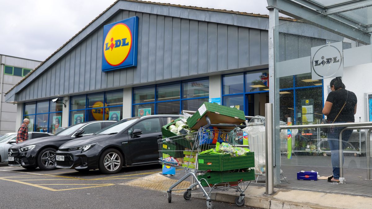 A shopping trolley full with groceries outside a Lidl Ltd. supermarket in London, UK, on Friday, June 24, 2022. The Office for National Statistics said Friday the volume of goods sold in stores and online fell 0.5% in May, as soaring food prices forced consumers to cut back on spending in supermarkets. Photographer: Hollie Adams/Bloomberg via Getty Images