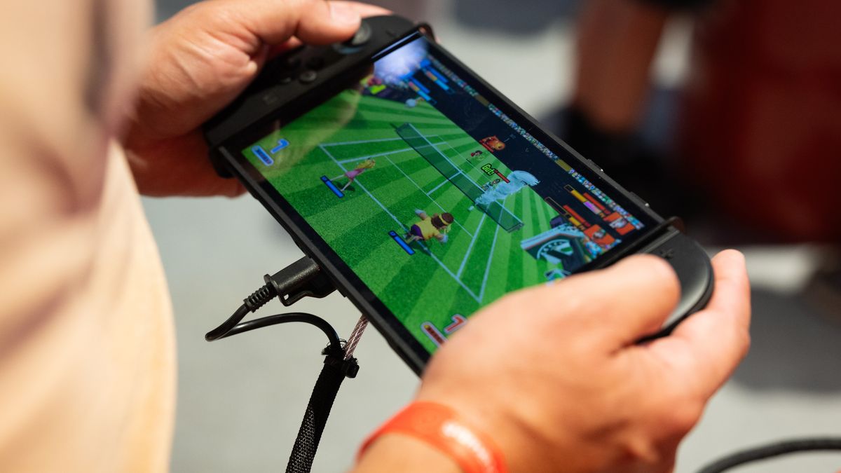 COLOGNE, GERMANY - AUGUST 27:  A gamer plays a video game on the NINTENDO switch 2 gamepad during the Gamescom 2026 computer gaming fair at Koelnmesse on August 27, 2026 in Cologne, Germany. This year's Gamescom will run from August 26-30. (Photo by Andreas Rentz/Getty Images)