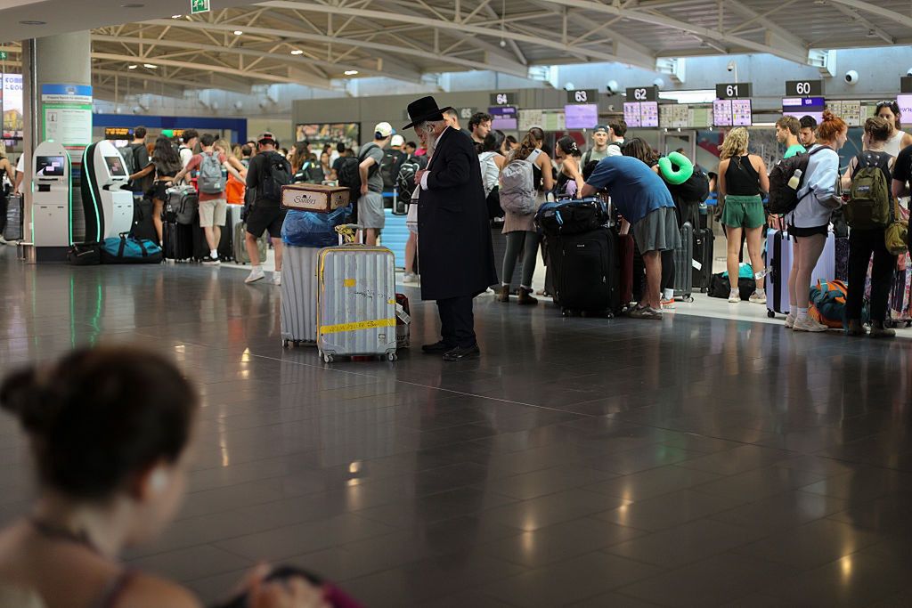 Cyprus Israel Evacuees
An Orthodox Jew and other evacuees from Israel wait for their flight at the check-in counter at Larnaca Airport. Cyprus, Wednesday, June 18, 2025 (Photo by Danil Shamkin/NurPhoto via Getty Images)
NurPhoto
flight number, flight, airline, departure, danil shamkin, passenger list, cyprus, check-in counter, passengers, larnaca airport, orthodox jew, air travel, evacuees, international travel, jewish community, nurphoto, destination, flight schedule, travel documentation, travel itinerary., june 18