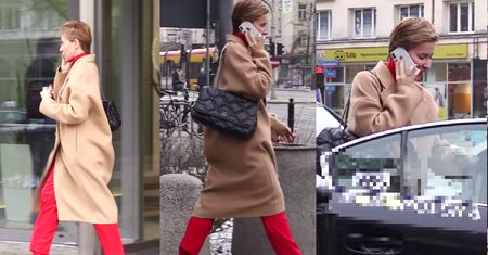 Warnke ignoruje paparazzi, rozmawiając przez telefon