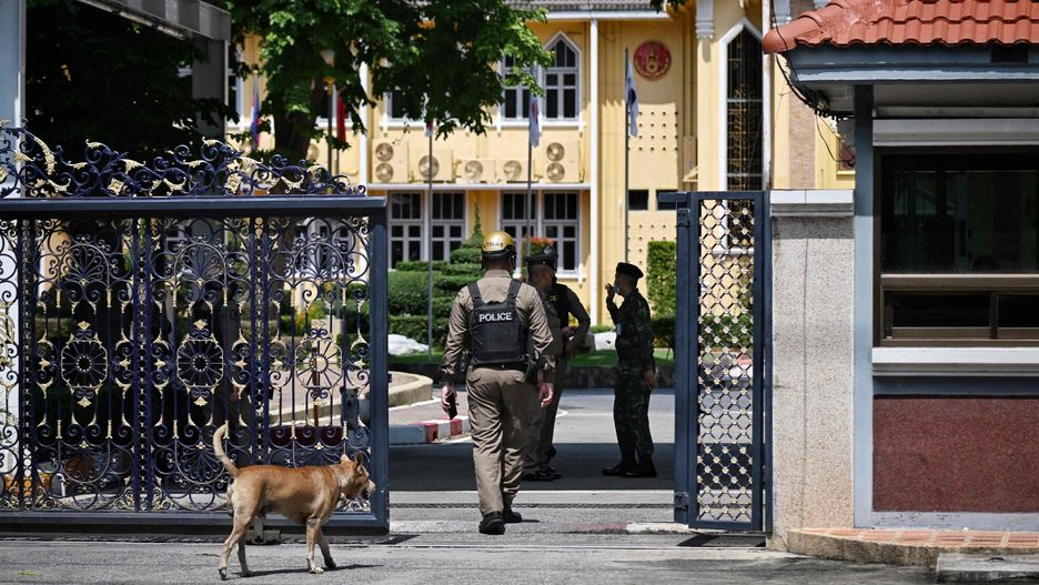 Temporary
Policemen outside the gates after an alleged shooter was detained in the Army Training Command in Bangkok on September 14, 2022. - A gunman killed one person and wounded two others in a shooting at a military facility in Bangkok on September 14, 2022, Thai police told AFP. (Photo by Lillian SUWANRUMPHA / AFP)
LILLIAN SUWANRUMPHA