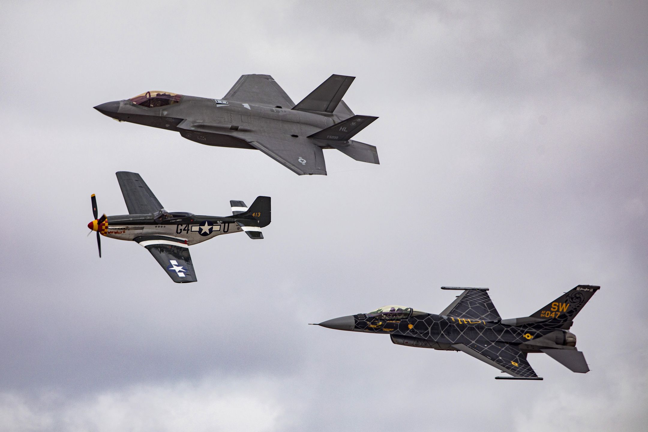 EL CENTRO, CALIFORNIA - MARCH 11: (Top to Bottom) An F-35 Lightning II, P-51 Mustang, and F-16 Fighting Falcon perform the Heritage Flight during the 2023 NAF El Centro Air Show at Naval Air Facility El Centro on March 11, 2023 in El Centro, California. (Photo by Daniel Knighton/Getty Images)