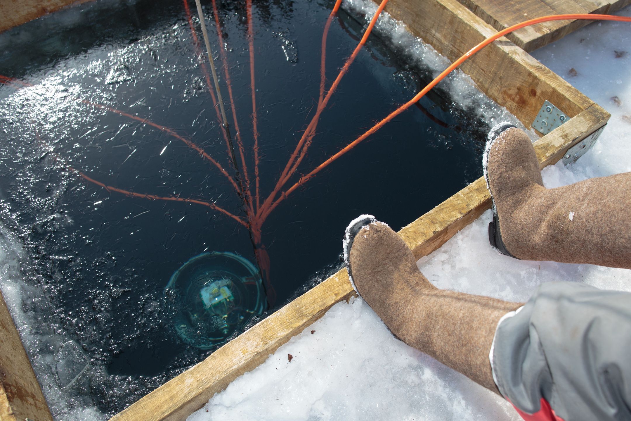IRKUTSK REGION, RUSSIA - MARCH 13, 2021: A ceremony to launch the Baikal Gigaton Volume Detector (Baikal-GVD) deep underwater neutrino telescope built on Lake Baikal. The project is aimed at studying the flux of high-energy cosmic neutrinos and searching for their sources. The telescope is installed 3.5 km offshore in Lake Baikal at the depth of 750-1300 m. Alexei Kushnirenko/TASS (Photo by Alexei Kushnirenko\TASS via Getty Images)