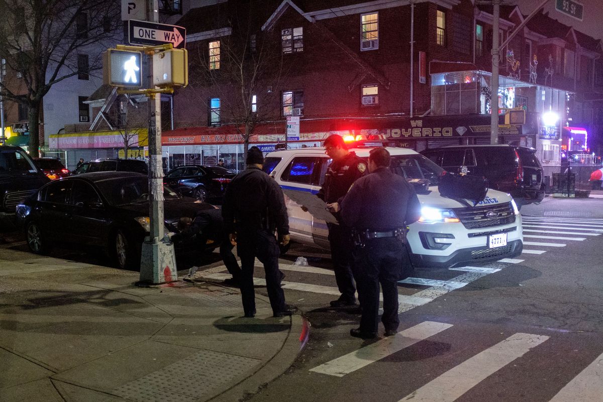 UNITED STATES -December 25: Police investigate an assault with a hammer on 37th Avenue and 93rd Street in Queens, New York City on Monday, December 25, 2023.  (Photo by Gardiner Anderson for NY Daily News via Getty Images)